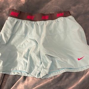 Blue Nike running shorts with built in spandex